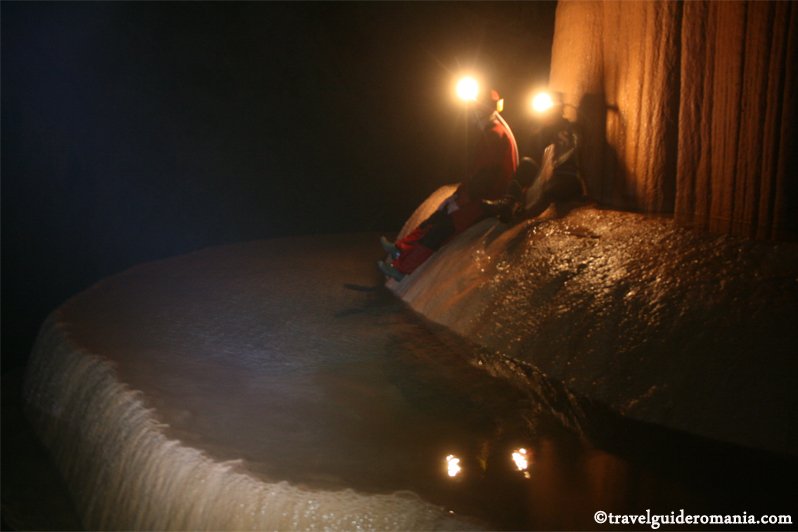 calcite pools filled with watter travel guide romania - Sura Mare cave