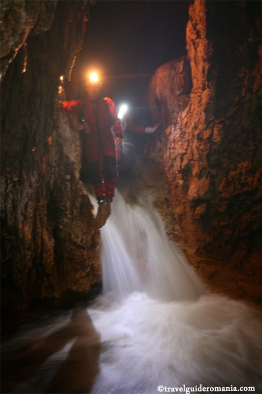 Waterfall in Sura Mare cave travel guide romania - Sura Mare cave