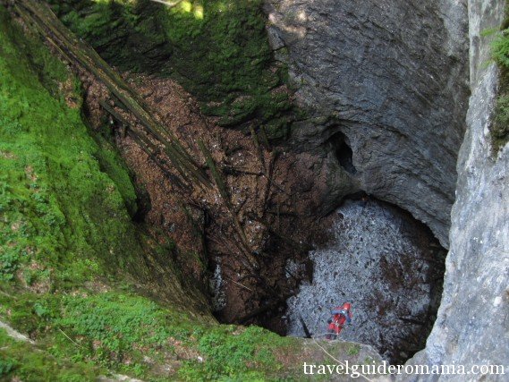 First pit of Bortig pothole - second largest underground glacier in Romania First pit of Bortig pothole - second largest underground glacier in Romania