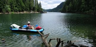 Kayaking on lakes in the Apuseni Mountains dragan lake apuseni