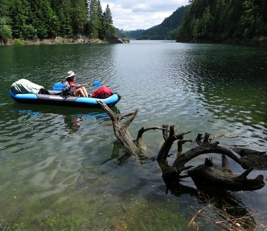 Kayaking on lakes in the Apuseni Mountains dragan lake apuseni
